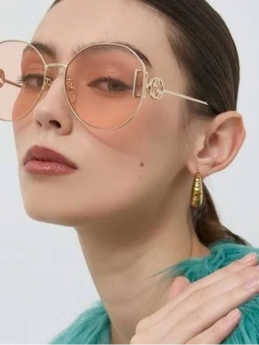 Gucci Gold Frame Sunglasses with Peach Lenses